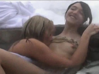Two enchanting teen lesbians pleasing each other's pussies in the spa
