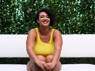 Busty curly brunette with big boobs fucks on couch