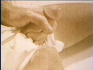 Well-endowed homeowner gets a blowjob from a horny salesman in this vintage video